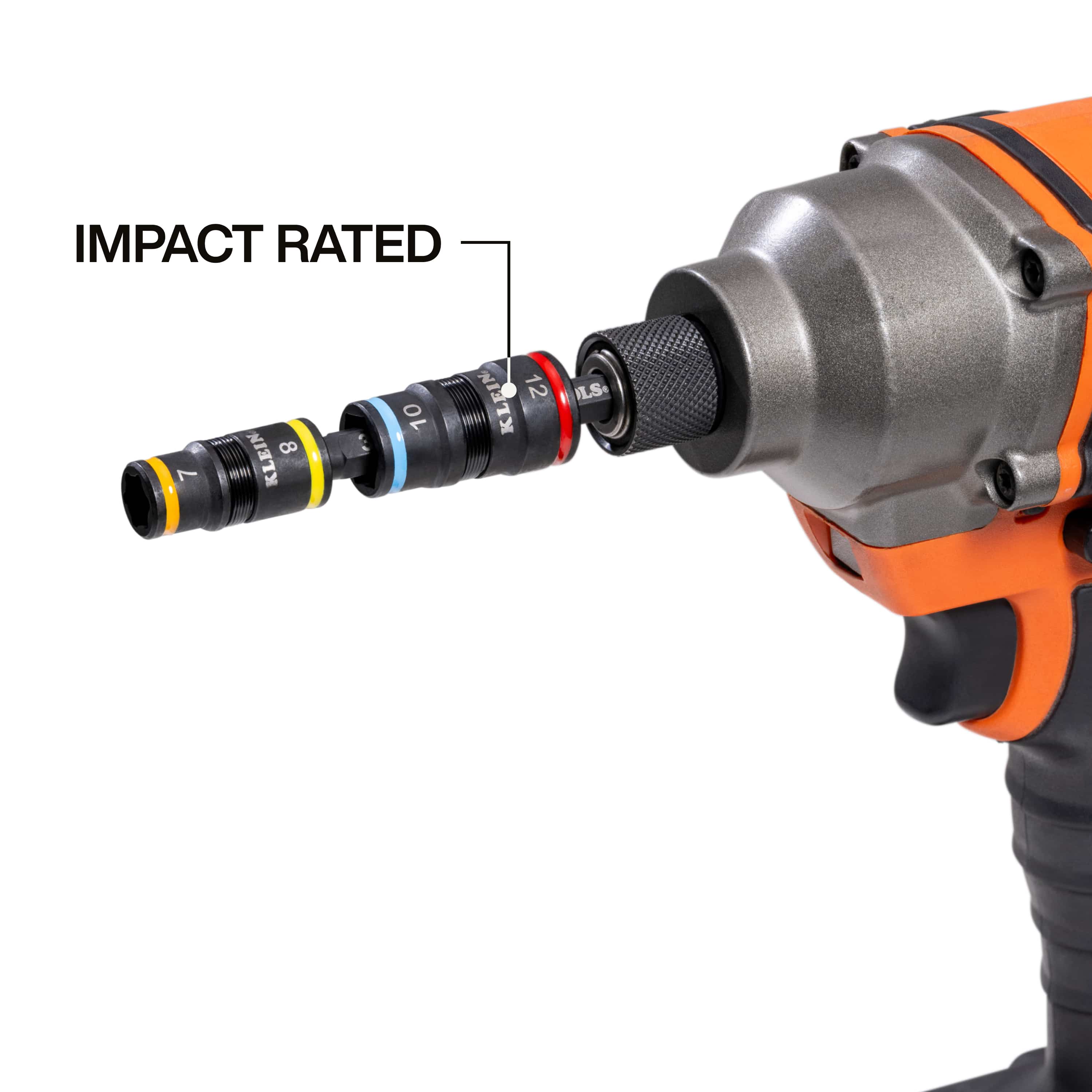 Klein 32932M 4-in-1 metric flip socket adapter locked into a power impact driver chuck for high-torque equipment fastening.
