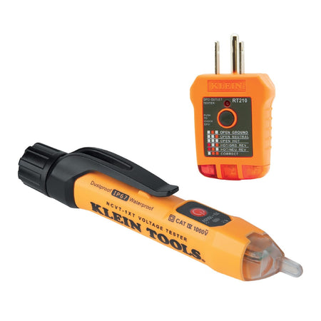 A studio shot of the Klein Tools NCVT1XTKIT premium test kit featuring the NCVT-1XT non-contact voltage tester and the RT210 GFCI receptacle tester. Both tools are shown in their high-visibility orange and black industrial housings, designed for professional electrical diagnostics and safety verification.