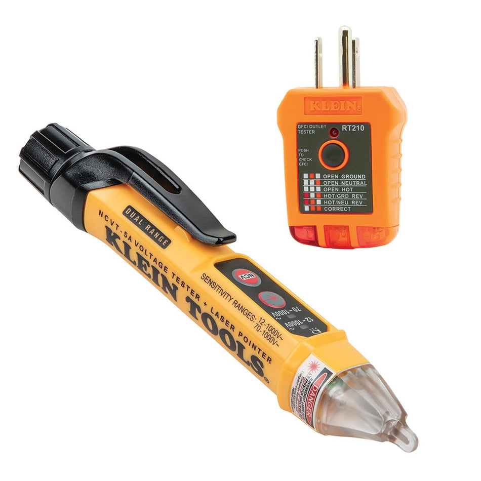 A high-angle studio shot of the Klein Tools NCVT5KIT electrical safety kit, featuring the NCVT-5A dual-range non-contact voltage tester with an integrated laser and the RT210 GFCI receptacle analyzer. Both professional diagnostic tools are shown in high-visibility orange and black industrial housings.