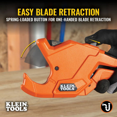 Instructional image showing the easy blade retraction feature on the Klein Tools 50044, utilizing a spring-loaded button for quick, one-handed operation on the job site.