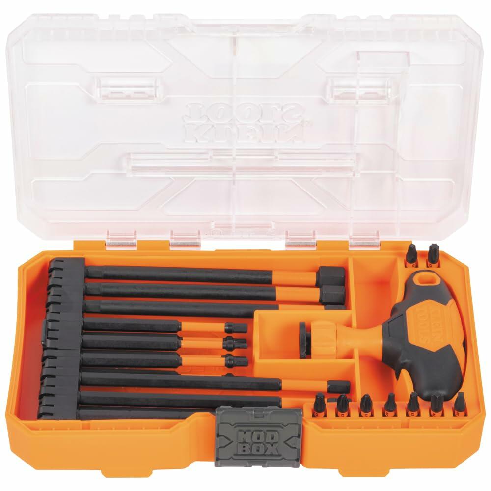 Overhead view of the Klein Tools 23-piece impact-rated bit set in its orange modular storage case with a clear lid, showing all components neatly organized.