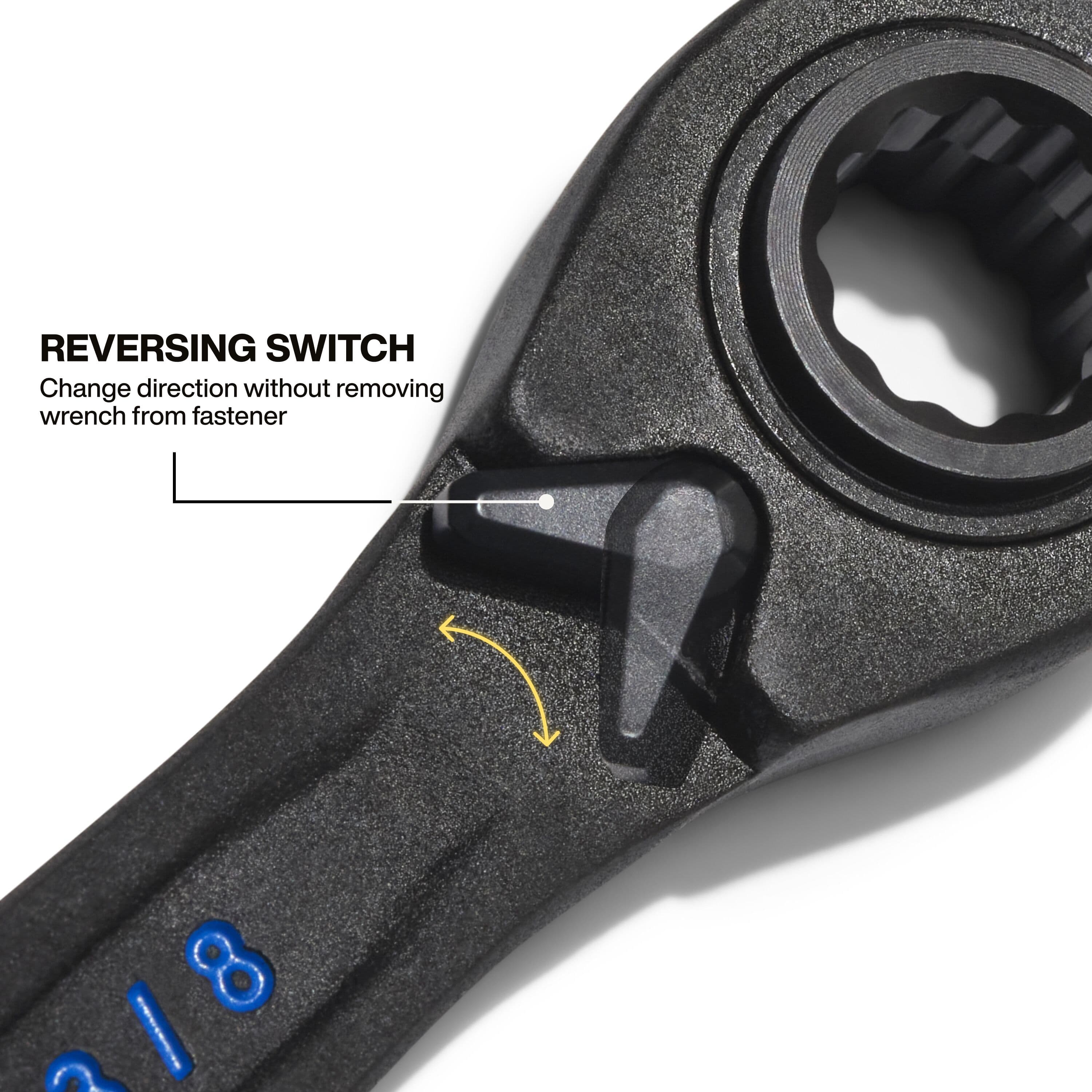 Close-up of the integrated thumb-reversing switch on the box head used to flip ratcheting direction without removing wrench from hardware.