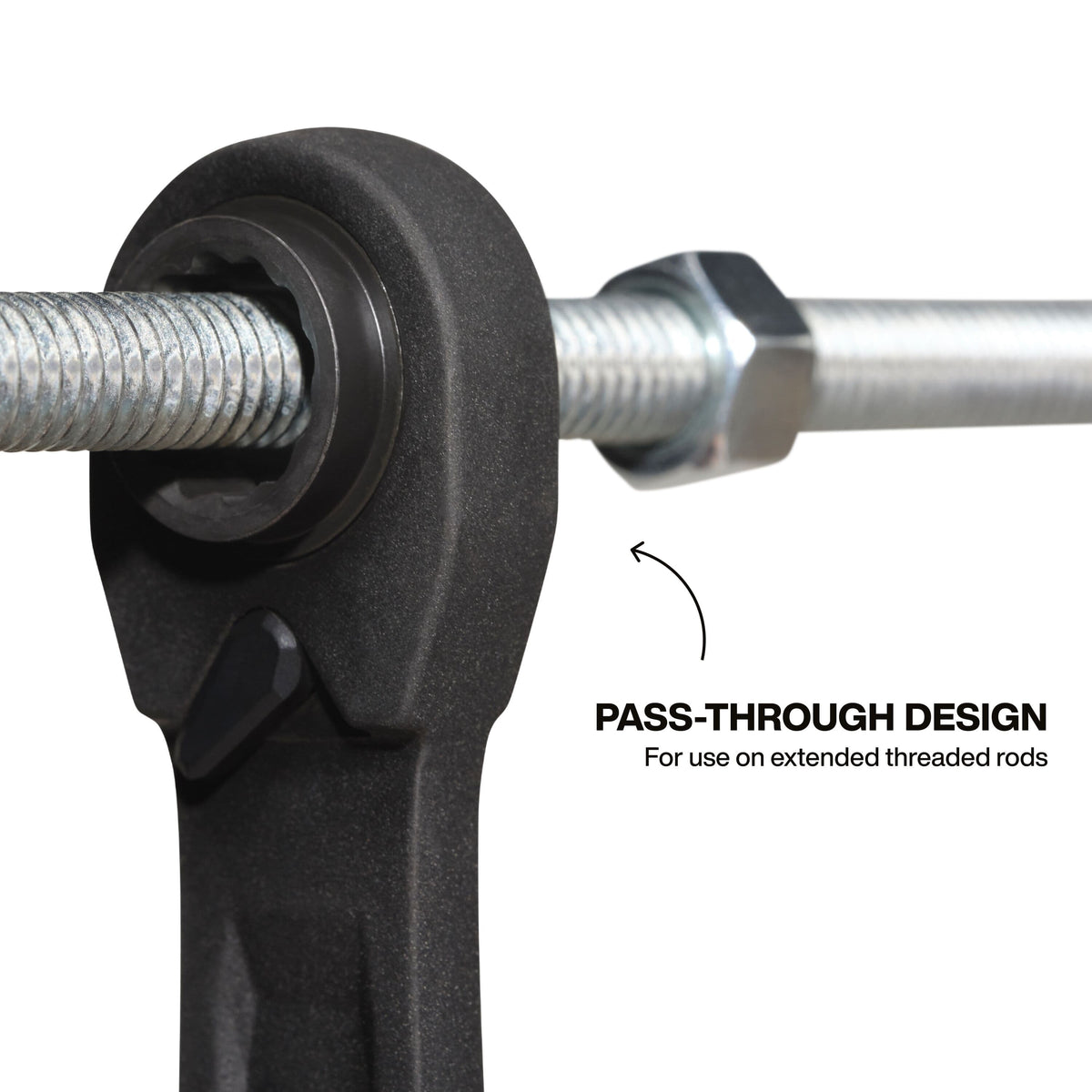 Close-up of a ratcheting box end running a nut down an all-thread rod to illustrate hollow pass-through depth clearance.