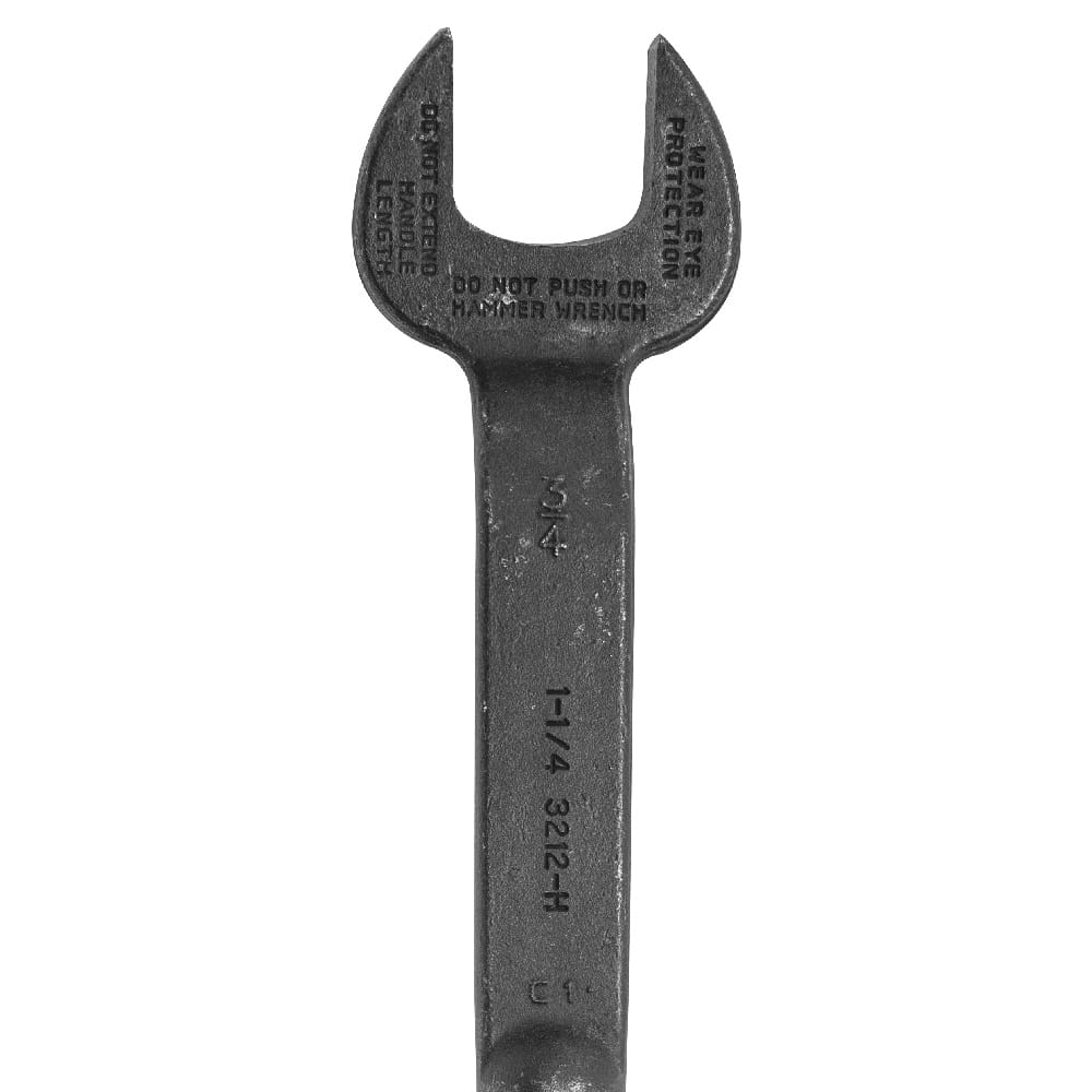 Close-up of the Klein 3212 spud wrench head detailing stamped 1-1/4-inch opening and 3/4-inch bolt size identification marks.