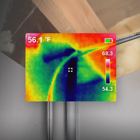 A digital thermal overlay image captured by the TI250 showing heat signatures in a residential attic. The screen displays a temperature reading of 56.1 degrees Fahrenheit, demonstrating the camera's ability to pinpoint thermal bridges and energy loss behind building insulation.