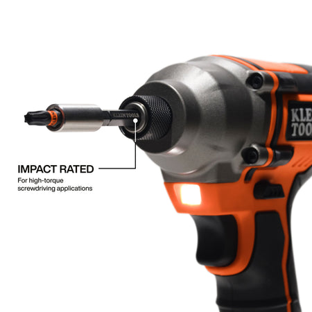 Klein cordless impact driver fitted with a 33510S tamperproof security bit and magnetic holder for high-torque fastening applications.