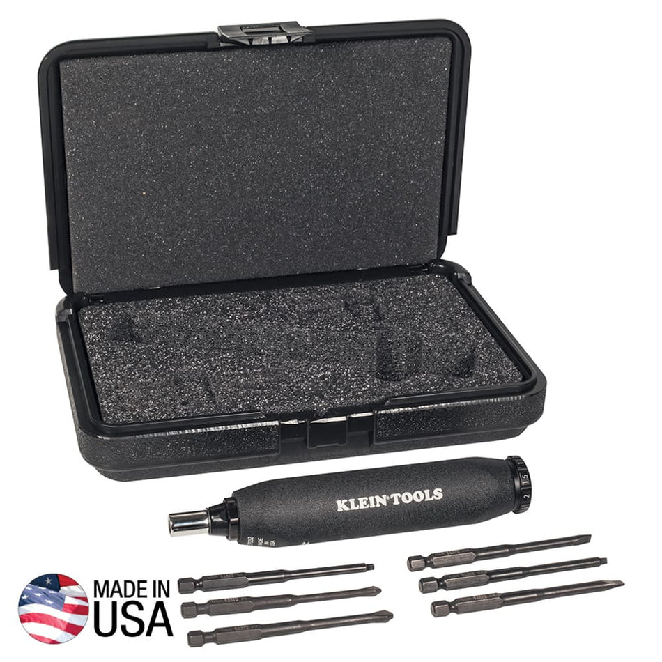 Klein 57032 torque screwdriver handle displayed beside six 3.5-inch power bits and open foam-lined case for safe storage.