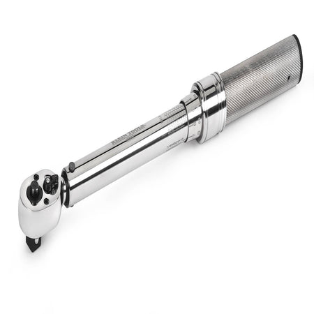 Knurled steel handle and micro-adjustable scale on the Klein 57010 wrench showing dual foot-pound and Newton-meter torque settings.