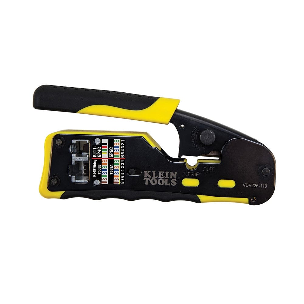 A profile view of the Klein Tools VDV226-110 ratcheting ethernet cable tool featuring a black and yellow handle, steel body with black oxide finish, and an integrated wiring guide for RJ45 and RJ11/RJ12 connections.