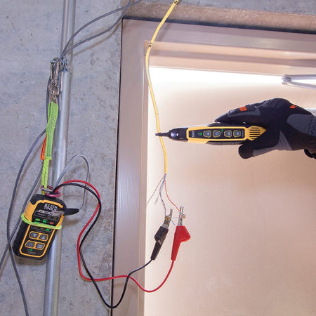 Action shot demonstrating the use of the VDV500123 tracing probe in a high-density network rack. The technician is shown using the probe to locate a single data cable among hundreds, highlighting the tool's precision in complex server room environments.