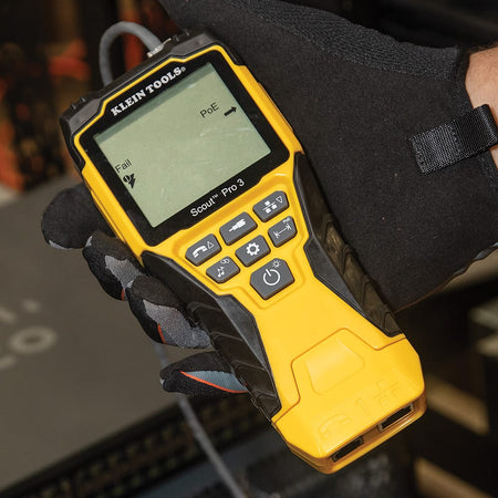 Action shot of the Scout Pro 3 cable tester identifying a Power over Ethernet (PoE) failure. The high-contrast digital display shows a "Fail" notification alongside the PoE icon, demonstrating the tool's ability to diagnose power supply issues on active network lines during professional troubleshooting.