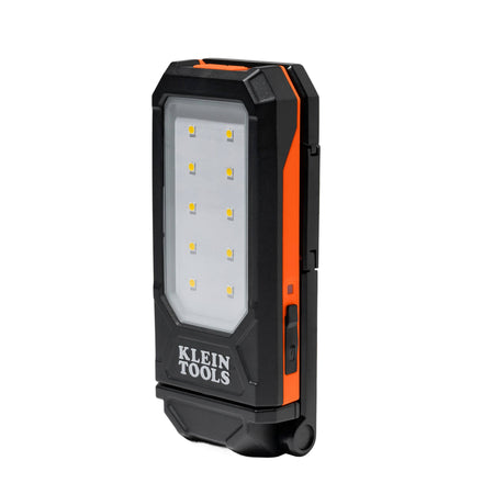 Klein Tools 56079 rechargeable LED personal work light with IP54 water resistance rating and 6.5-foot drop protection for rugged jobsite use.