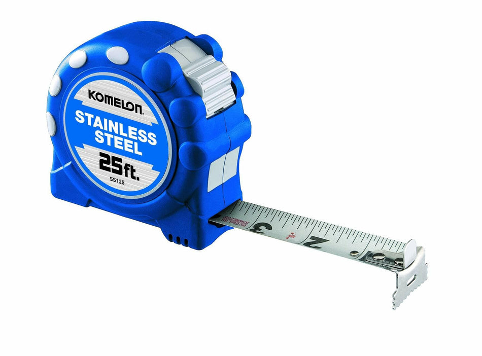 A three-quarter view of the Komelon 25 ft stainless steel tape measure in its blue rubberized case with the blade extended to the 3-inch mark.