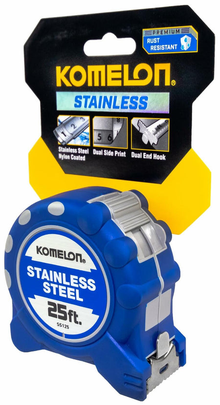 The Komelon 25 ft stainless steel tape measure in its blue and black retail packaging, highlighting its rust resistance, dual side print, and dual end hook.