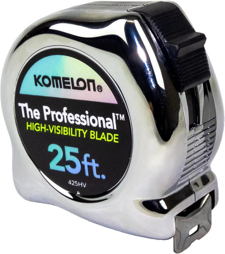 Angled studio view of the Komelon Professional tape measure showing the reflective chrome housing, the black slide lock mechanism, and the high-visibility branding label.