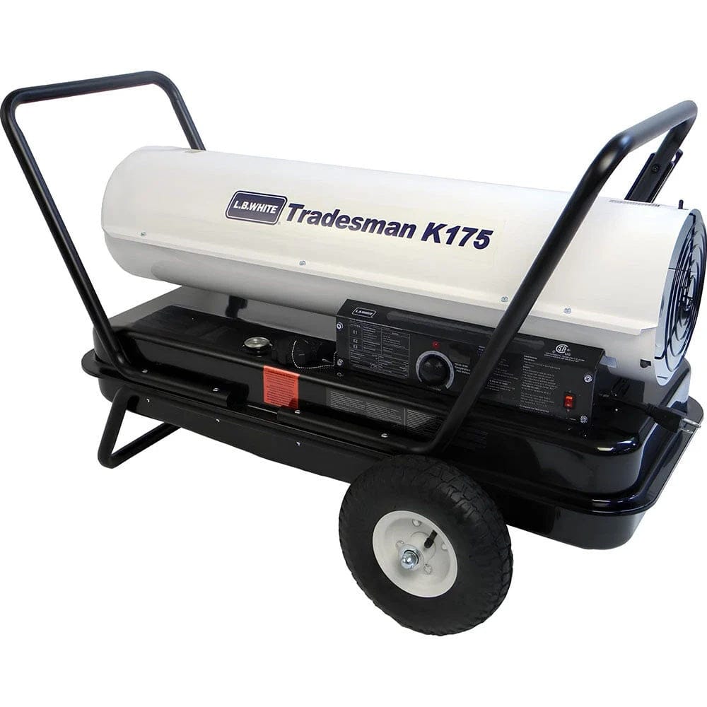 A close-up side view of the LB White Tradesman K175 focusing on the black 13-gallon fuel tank, heavy-duty no-flat tires, and the detailed instruction and safety labeling on the side of the unit.