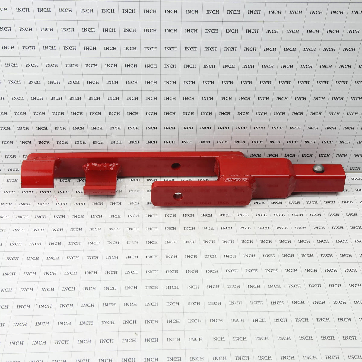 Little Beaver 30322 utility anchor adapter placed against a measurement grid to show the industrial scale and dimensions of the one-man installation tool.