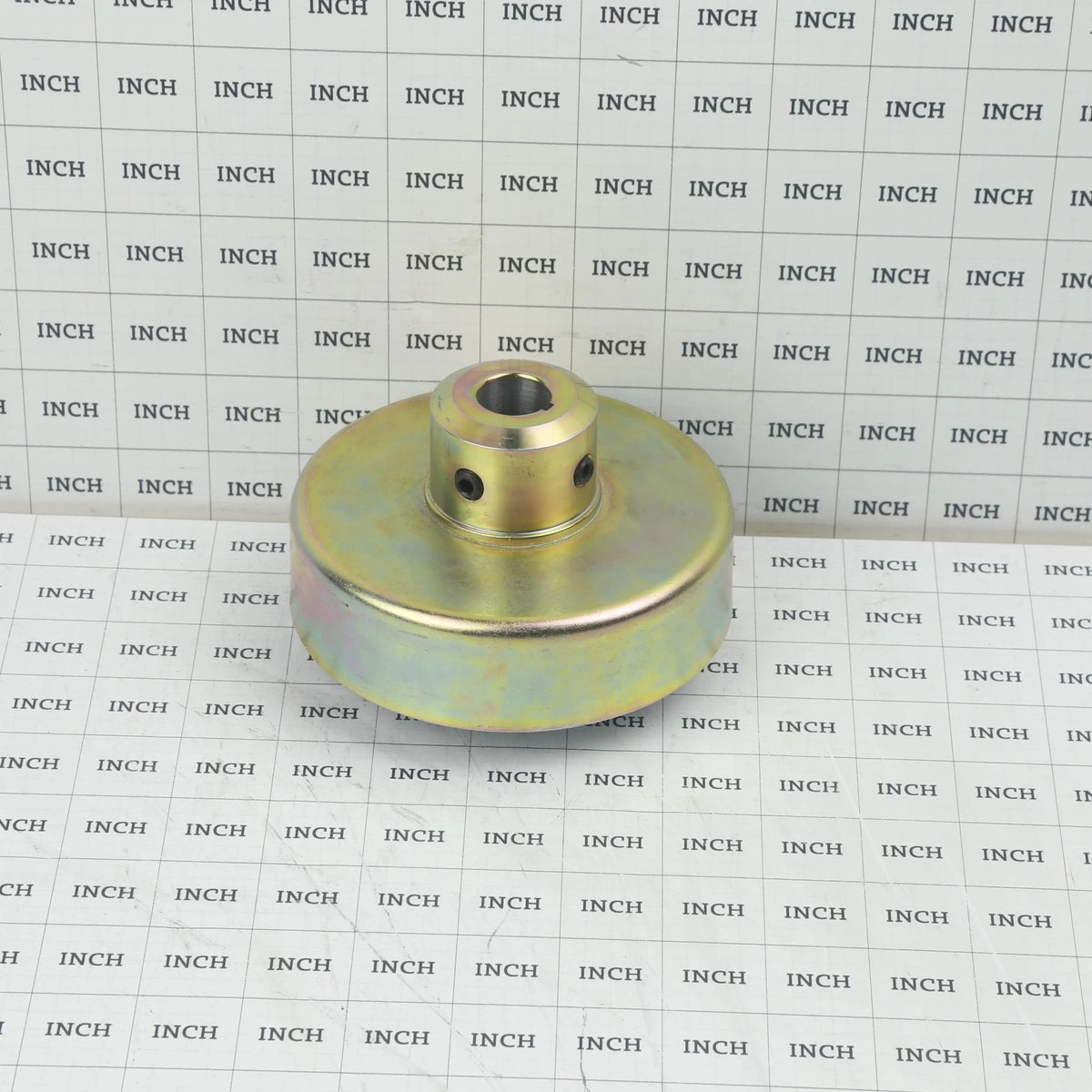 Little Beaver CCO-5# clutch drum measured on an inch grid scale showing the 3/4-inch engine bore collar height.