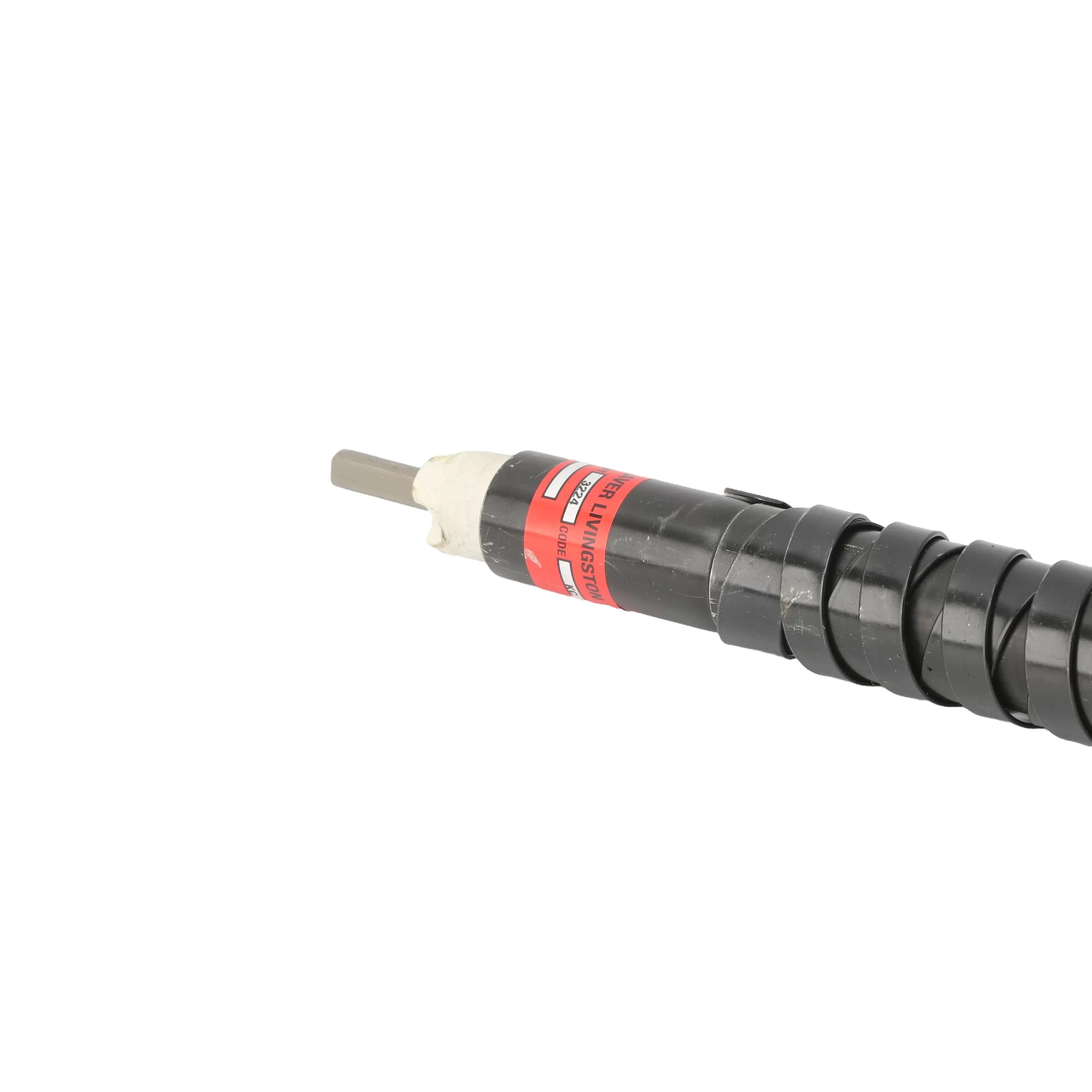 Profile perspective view focusing on the quick-connect male driver spindle end of the flexible shaft assembly, showcasing the thick interlocking protective steel ribbon spiral wrap that transitions into the heavy-duty rubber casing.