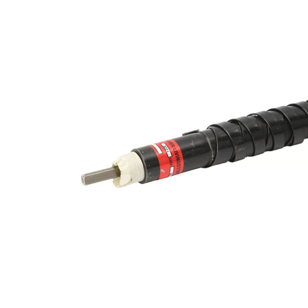 Detailed close-up showing the square metallic inner core head of the flexible auger drive shaft extending from the sealed white bushing seat, backed by the red model label reading code 3324.