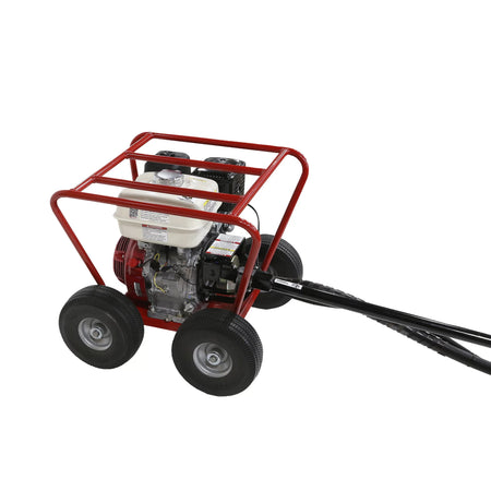 Rear three-quarter perspective photo of the gas-powered earth drill platform highlighting the direct mechanical connection where the black protective sleeve of the torque bar links into the engine frame chassis.