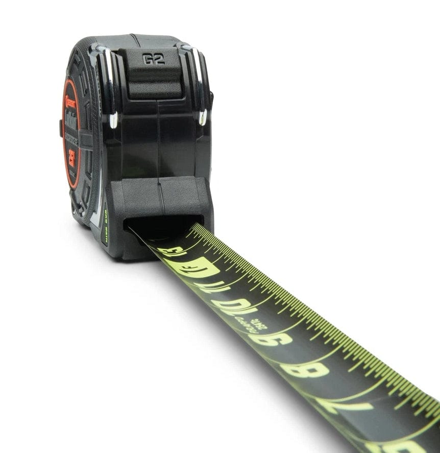 A top-down studio shot of the Lufkin Shockforce G2 tape measure, showing the "G2" logo on the black auto-lock button and the black and green Nite Eye blade extended.