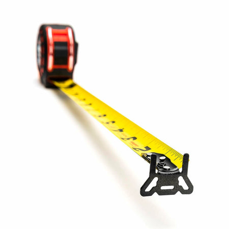 A close-up, low-angle shot of the Lufkin Shockforce tape measure's extended yellow blade and advanced 360-degree end hook on a white background.