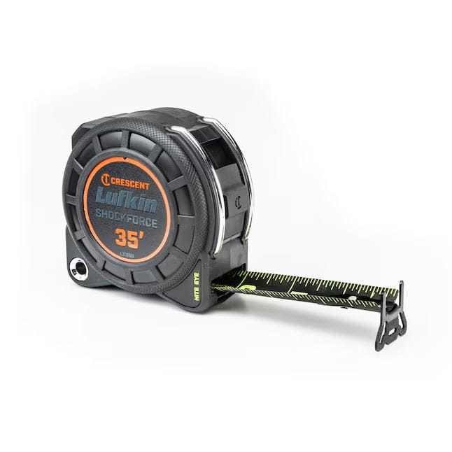 A three-quarter studio shot of the Crescent Lufkin Shockforce 35-foot tape measure, showing its rugged black and orange case and the Nite Eye blade partially extended.