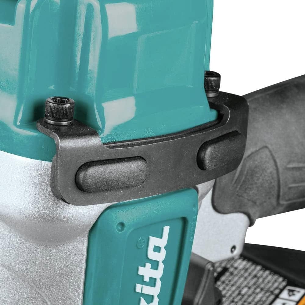 A close-up studio shot of the steel wear plates and rubber pads on the top of the Makita AN454 nailer's housing.