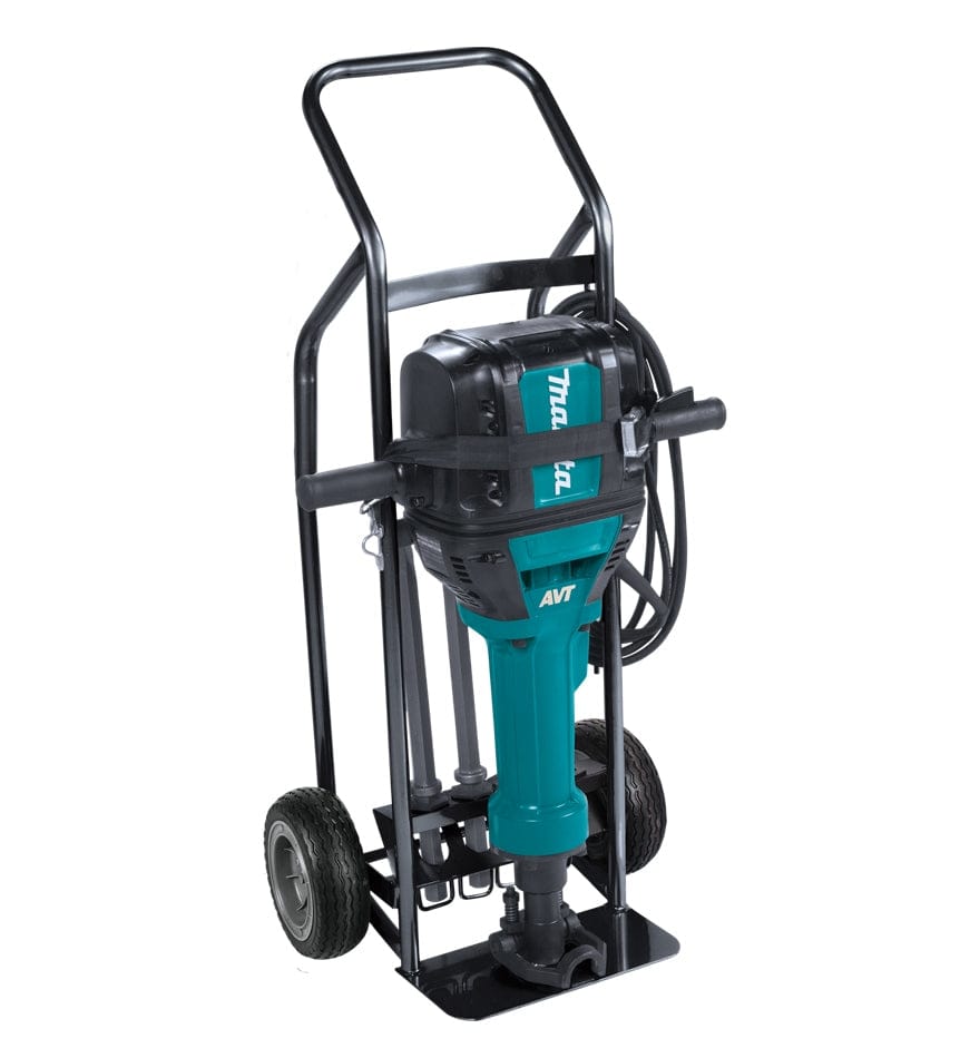 Makita demolition hammer with AVT label, teal and black body, and chisel attachment for concrete breaking.