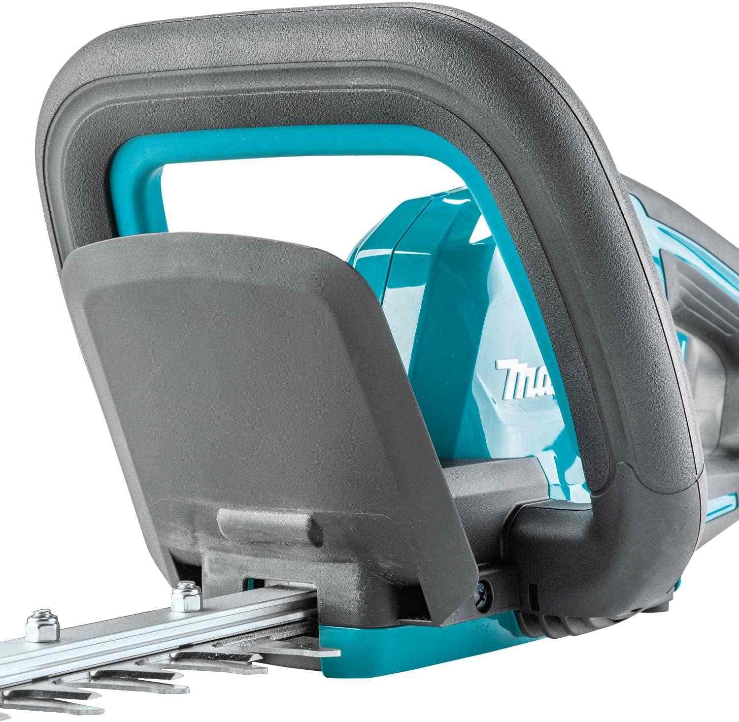 Close-up of the front loop handle and integrated hand guard on the Makita XHU09Z cordless trimmer, designed for operator safety and maneuverability during vertical or horizontal trimming.