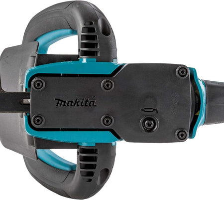 Top-down view of the Makita hedge trimmer gear housing featuring the integrated grease port bolt for easy maintenance and lubrication of the 4,000 SPM drive system.