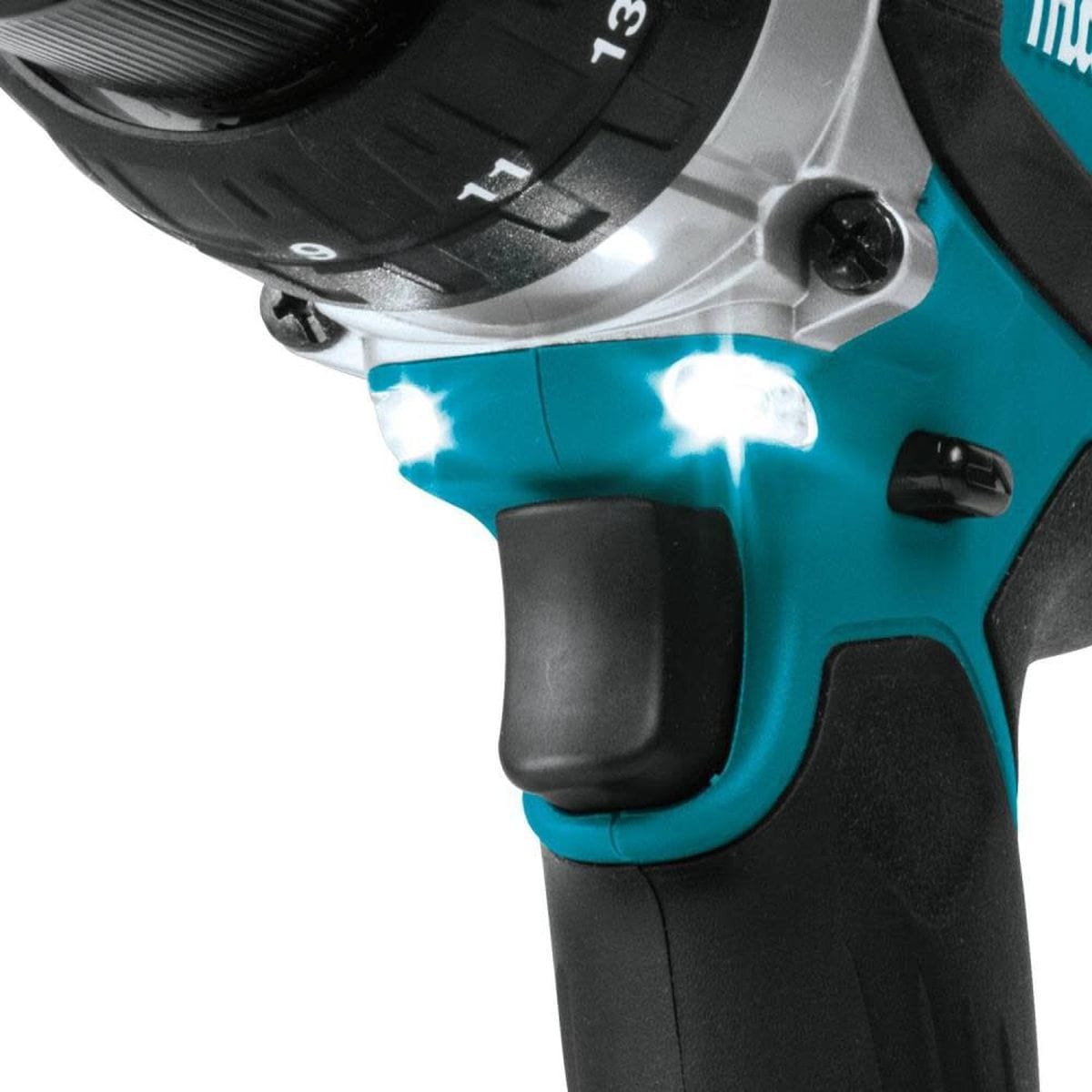 Close-up of a power tool with a focus on the handle and switch area.