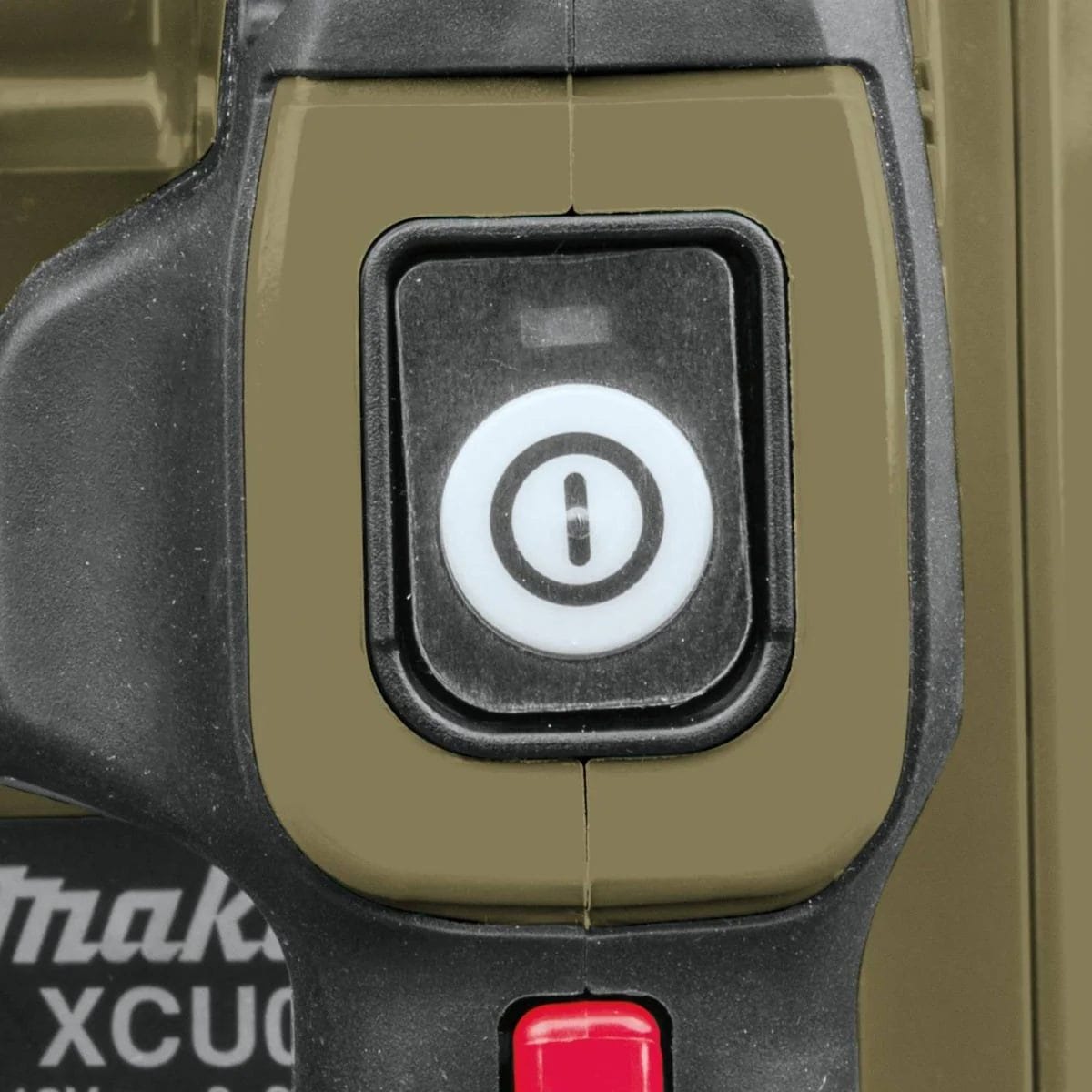 View of the built-in LED on-off switch with auto power-off function on the Makita 18V cordless chain saw, optimized for extending battery life during outdoor use.
