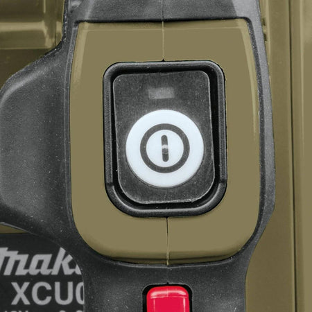 View of the built-in LED on-off switch with auto power-off function on the Makita 18V cordless chain saw, optimized for extending battery life during outdoor use.