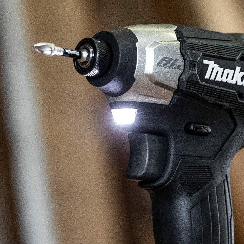 A detailed view of the front of the Makita XDT18ZB, highlighting the bright, illuminated dual LED work lights.