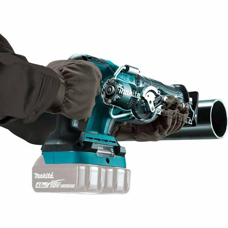 A transparent view of the Makita XRJ06Z reciprocating saw showing the internal brushless motor and crank mechanism while cutting a pipe.