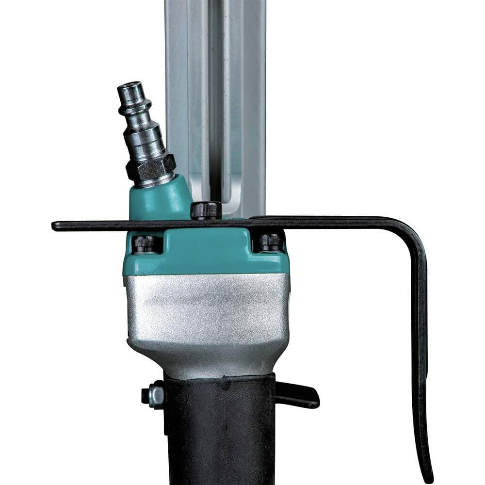 Close-up of the air inlet fitting and the reversible tool hook located at the top of the Makita AN924 framing nailer.