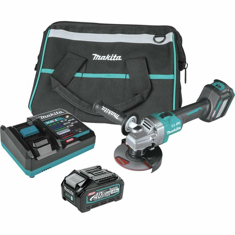 Makita GAG04M1 angle grinder kit including tool, battery, charger, and branded carrying bag; components arranged for display with ergonomic design features.