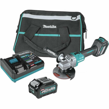 Makita GAG04M1 angle grinder kit including tool, battery, charger, and branded carrying bag; components arranged for display with ergonomic design features.