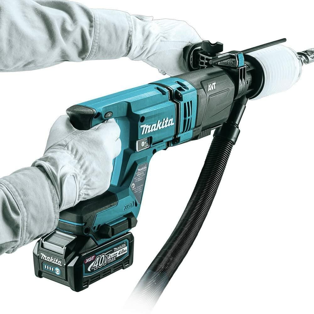 Person using Makita cordless autofeed screwdriver with screw strip attached; tool powered by 40V XGT battery, user wearing gloves during construction task.