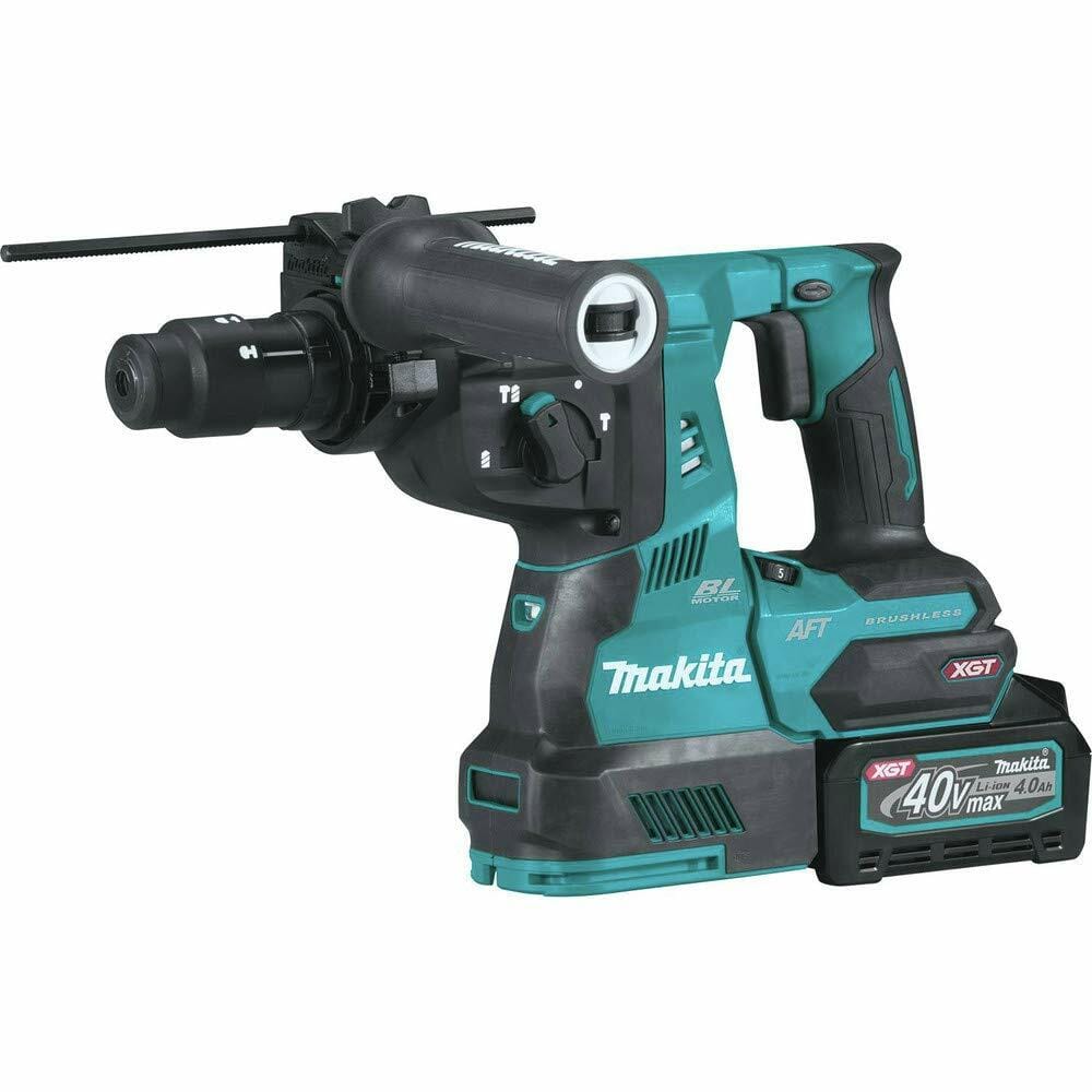 Makita GRH02 rotary hammer drill with side handle and depth gauge rod; labeled with BL Motor and AFT, designed for heavy-duty concrete drilling.