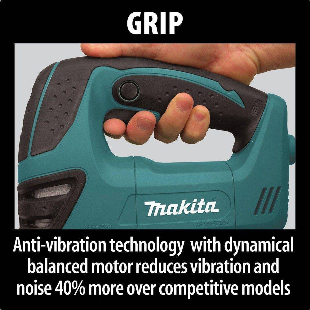 Close-up side view of the Makita jig saw with a T-shank blade installed, emphasizing the orbital setting dial and the clear plastic dust shield for improved line-of-sight accuracy.