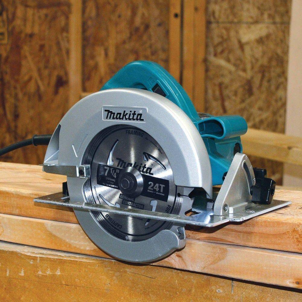 Action shot of the Makita 5007FA corded circular saw resting on dimensional lumber, showcasing the 24T framing blade and professional build quality.