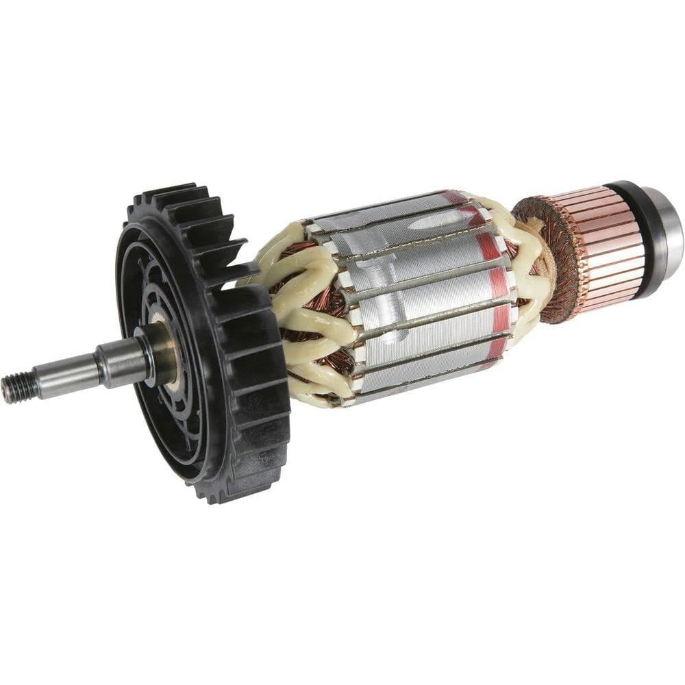 Close-up of rotor assembly with copper windings, laminated iron cores, and black gear; internal motor component used in power tools for mechanical energy transfer.