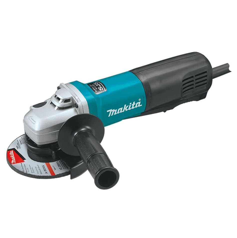 A studio product shot of the Makita 9565PCV 5-inch SJS angle grinder featuring its iconic teal and black body, powerful 13 Amp motor, side handle, and installed grinding disc.