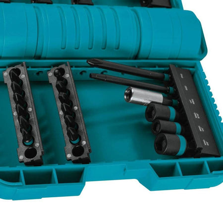 A detailed close-up of the Makita ImpactX case interior, highlighting the 90-degree rotating bit keepers that allow for easy removal of the precision-machined S2 steel bits and nut drivers.