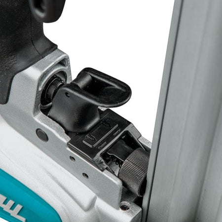 A detailed close-up of the "tool-less" depth adjustment dial on the side of the Makita AF506 brad nailer.