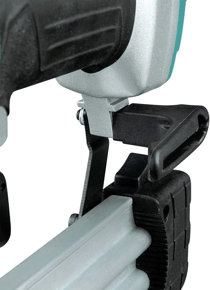 A detailed close-up of the reversible belt hook attached to the Makita AF506 nailer.