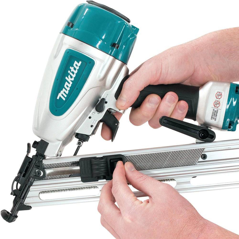 Close-up of the tool-less depth adjustment dial on the Makita AF635 pneumatic angled finish nailer, engineered for precise flush and countersink fastening in woodworking.